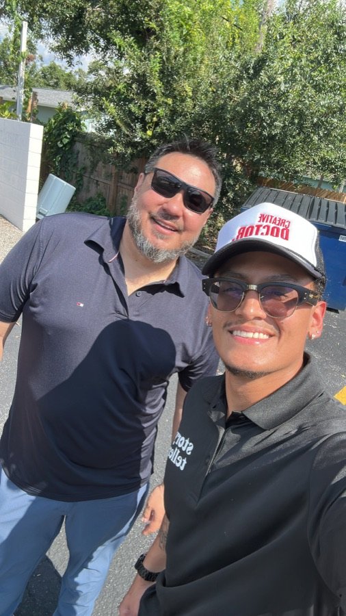 Allan with a client outside on shoot day